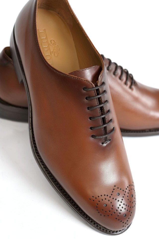 Med-brown whole cut shoes