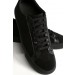 Black suede trainer